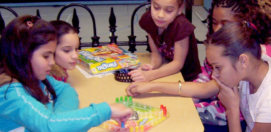 Kids playing board games.