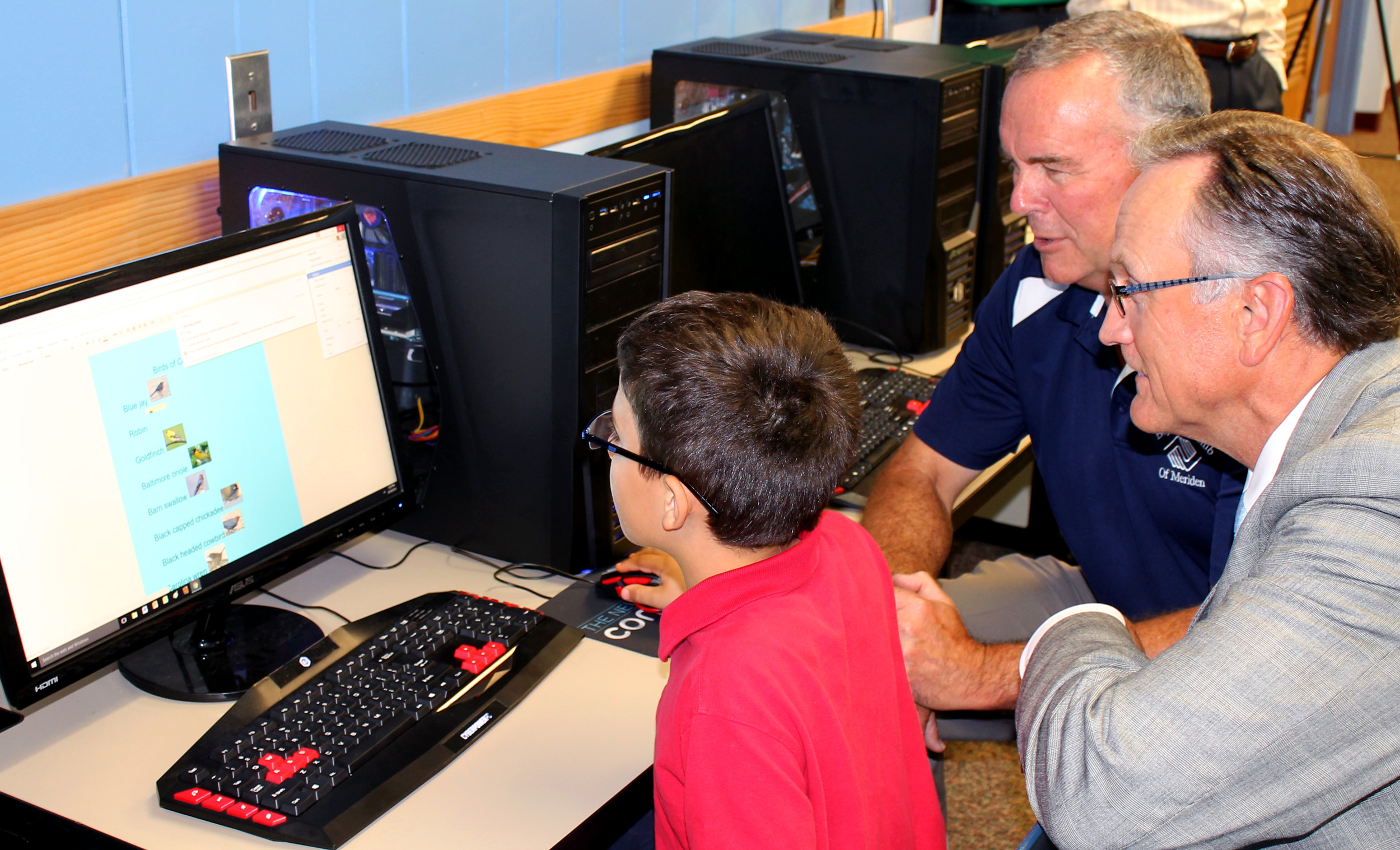 Club member demonstrates the new computers